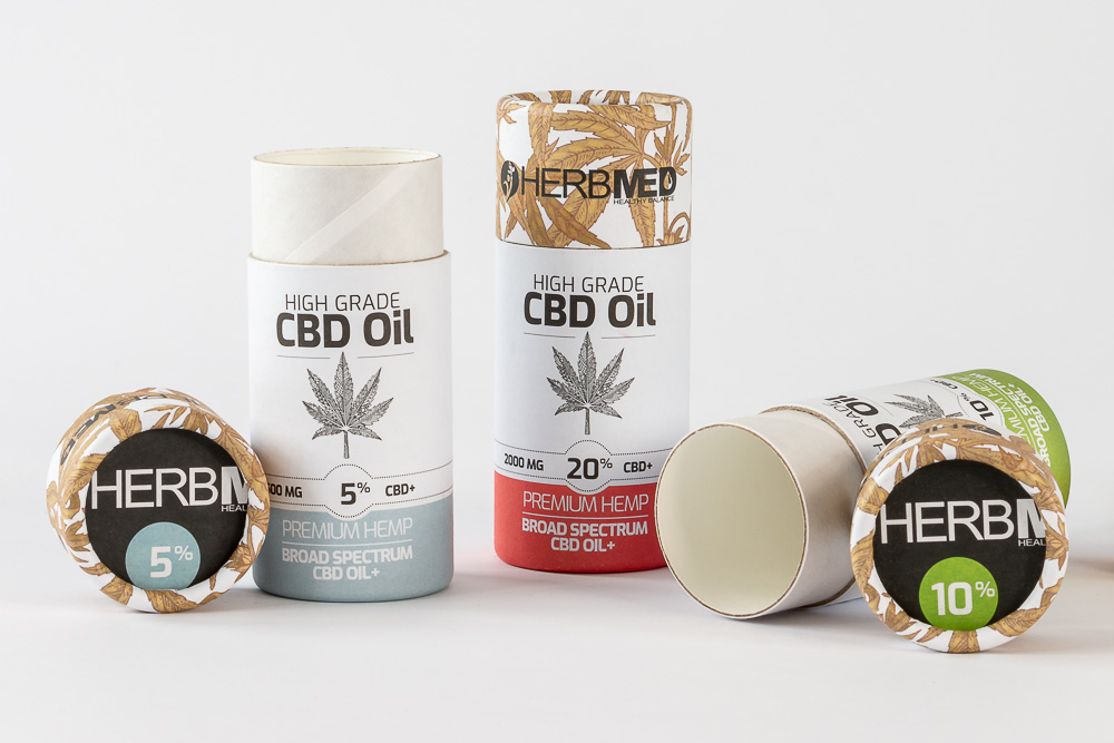 Product photography of CBD oil packaging showing inside of tube
