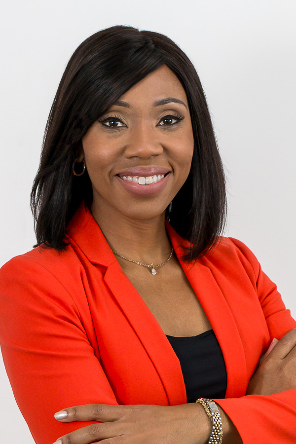 Example of female headshot against white backdrop